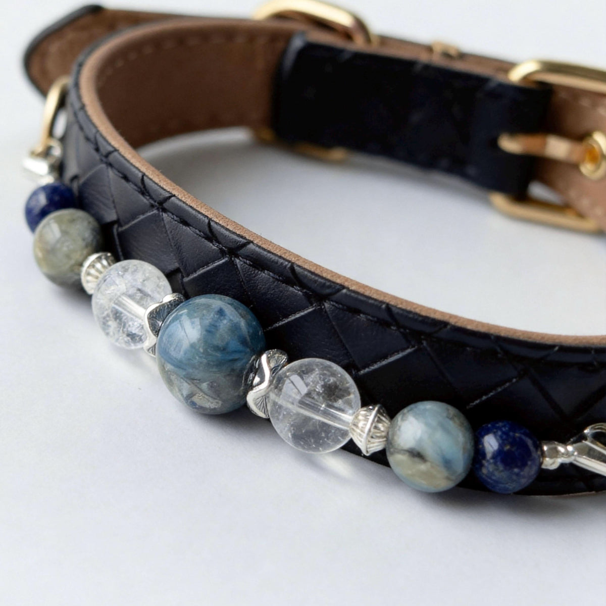 Close-up of black quilted faux leather pet collar with blue natural stone and crystal beads | DIY Jade