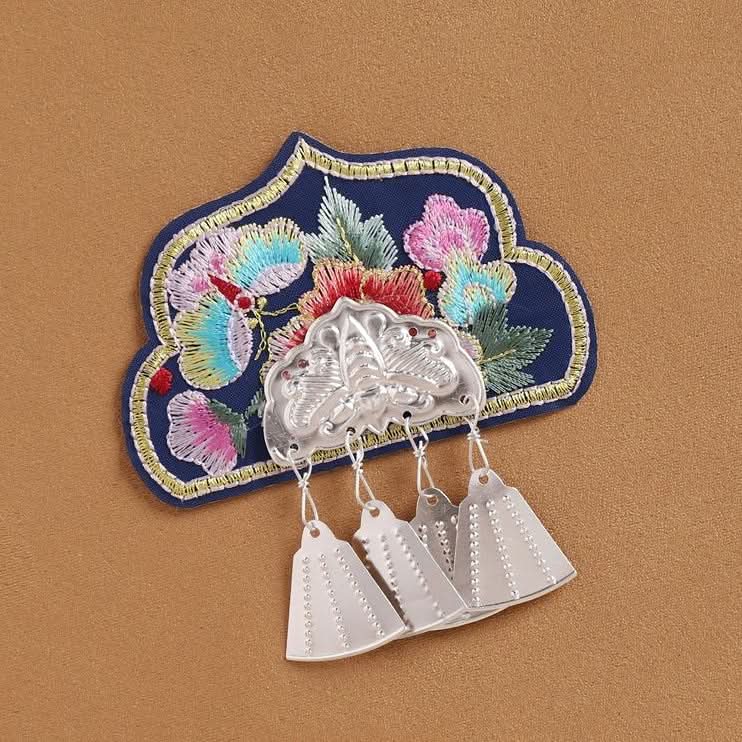 Blue embroidered tassel wall hanging