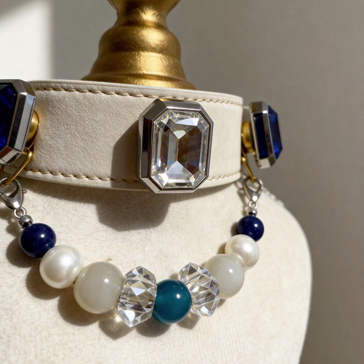 Mannequin bust showing white leather pet collar with sapphire beads | DIY Jade