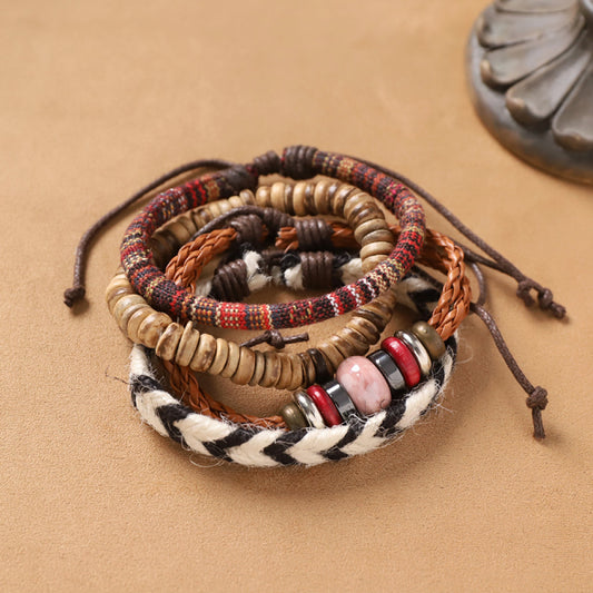 Multi-layer boho woven and beaded bracelet stack on neutral background | DIY Jade
