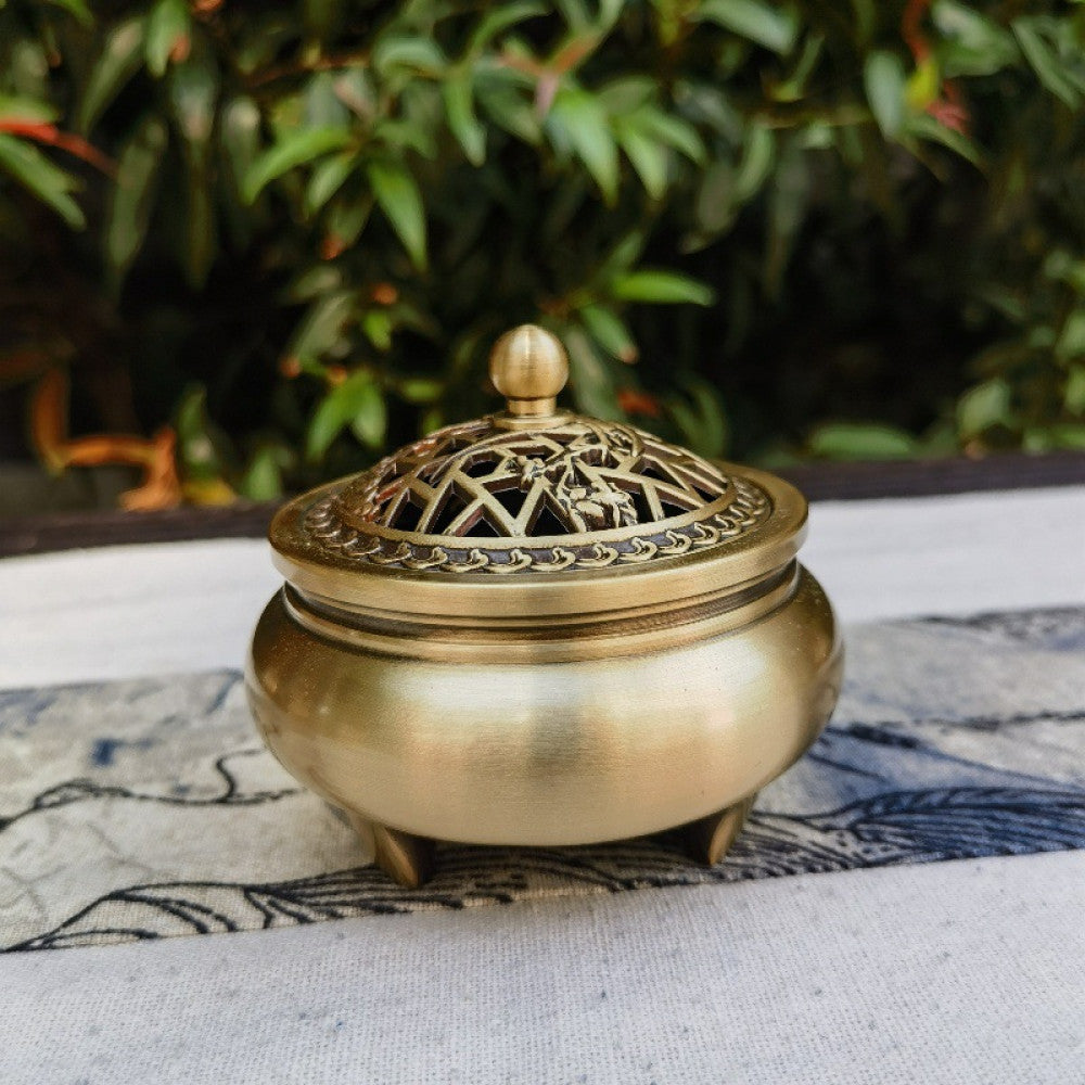 Brass incense burner with deer-themed openwork lid, outdoor lifestyle photo | DIY Jade