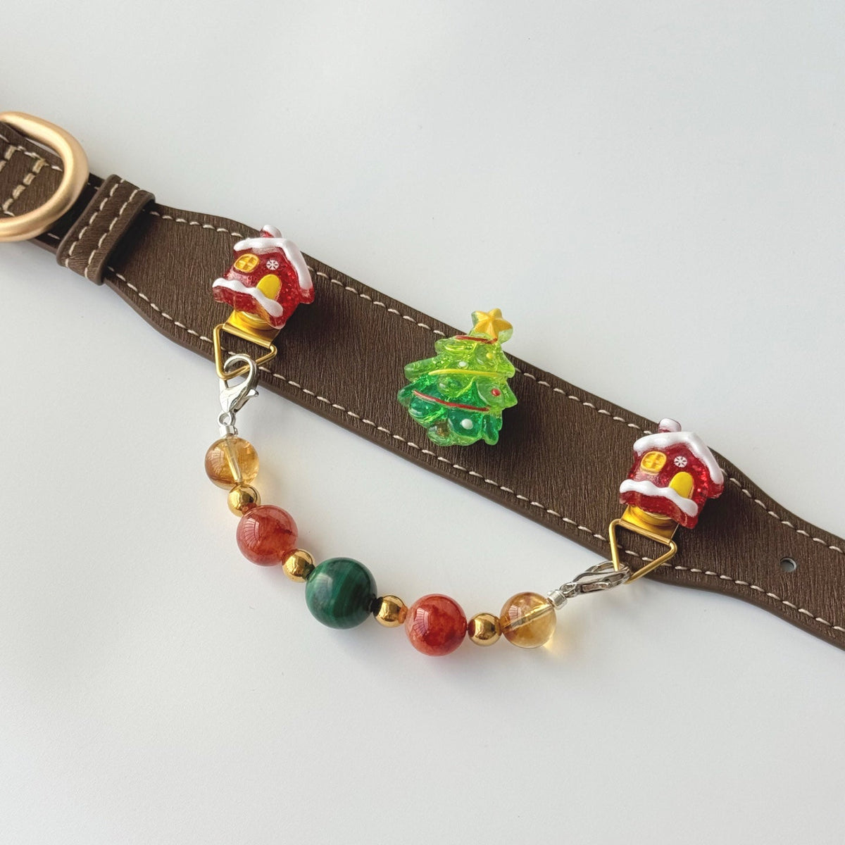 Side flat shot of brown christmas cat collar, detachable malachite citrine gem bead chain with cute holiday house and tree ornaments | DIY Jade