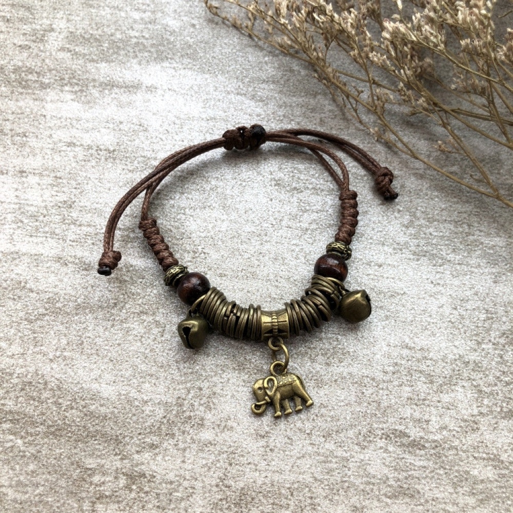 Tiny woven brown bracelet with delicate feather charm | DIY Jade