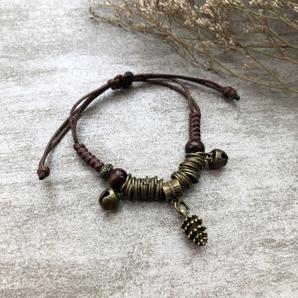 Boho woven bracelet with tiny bronze fishbone charm | DIY Jade