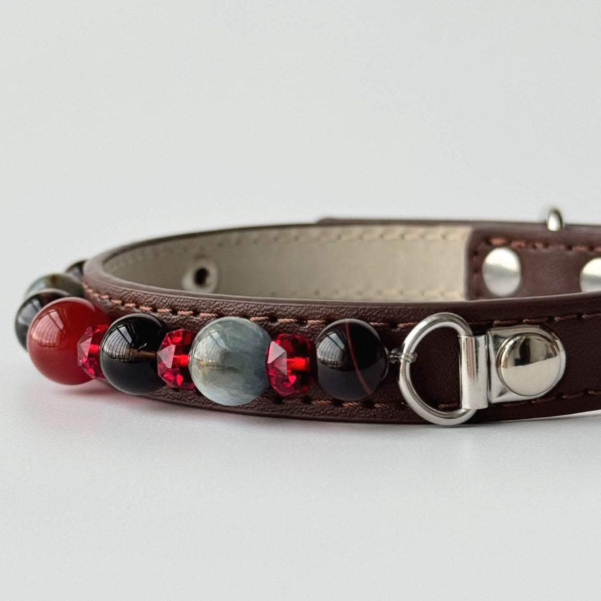 Closeup of brown leather pet collar with mixed gem beads and silver buckle | DIY Jade