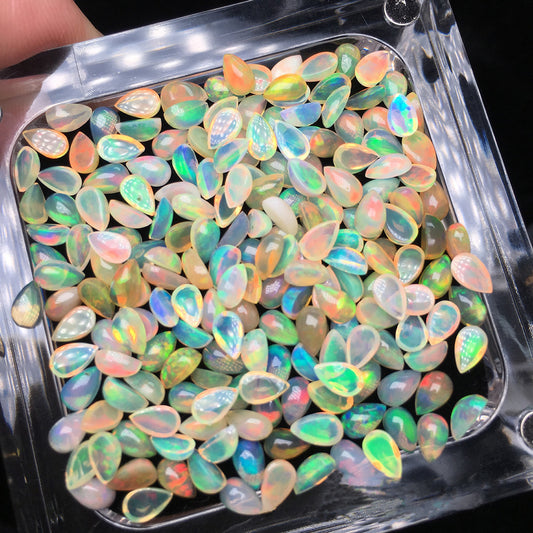 Natural teardrop pear-cut opal loose gemstones with iridescent play of color for jewelry crafting | DIY Jade
