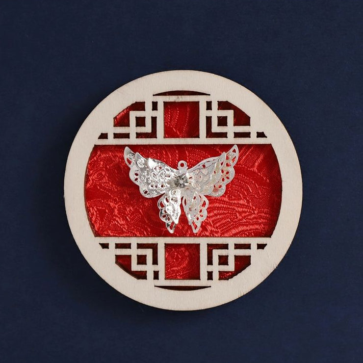 window‑lattice round fridge magnet, silver butterfly on red fabric, cultural souvenir