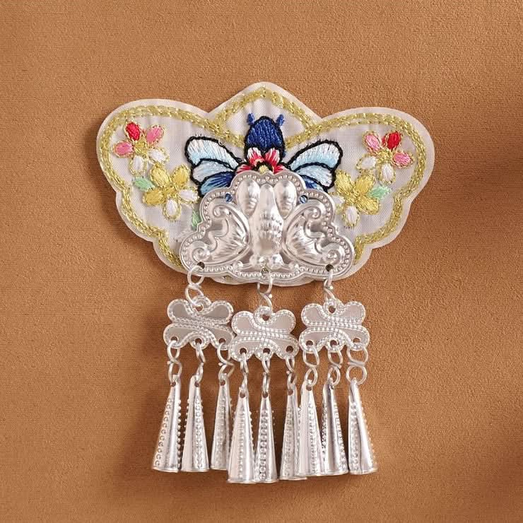 Butterfly motif embroidery patch, bright floral print with multi‑group silver tassels