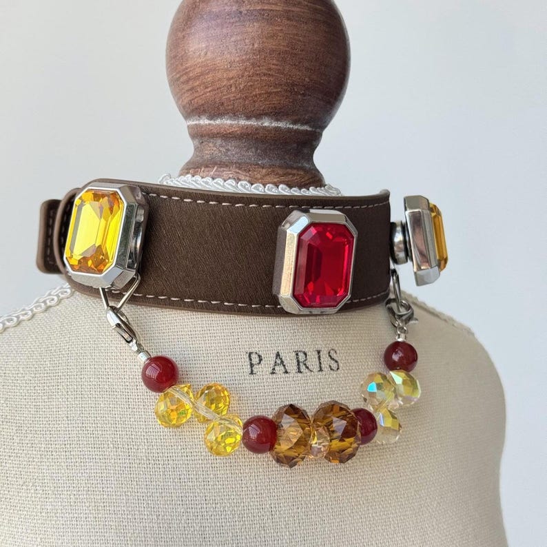 Gemstone pet collar on a display stand — iridescent crystal drop version|DIYJade