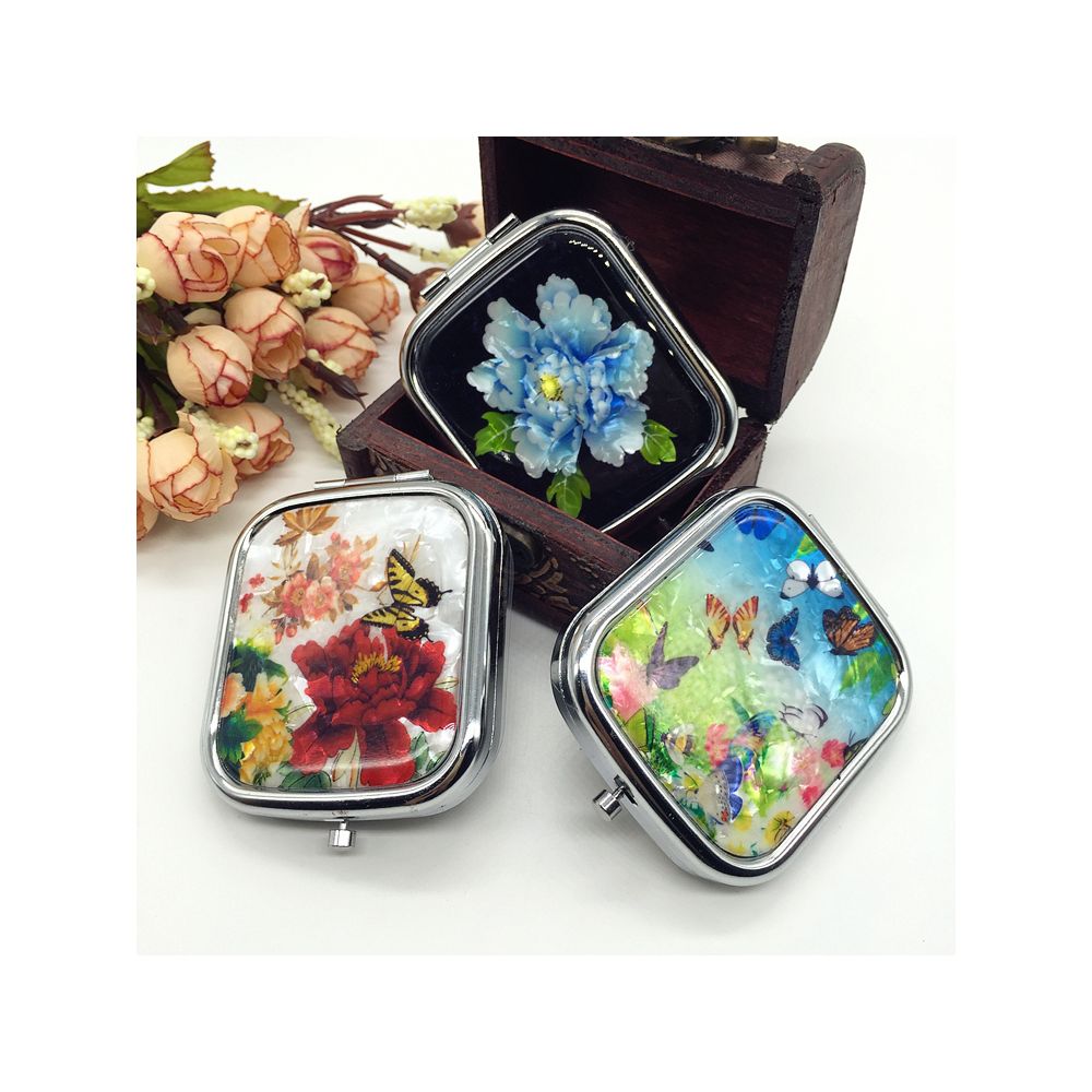 Colorful floral pill boxes with storage case