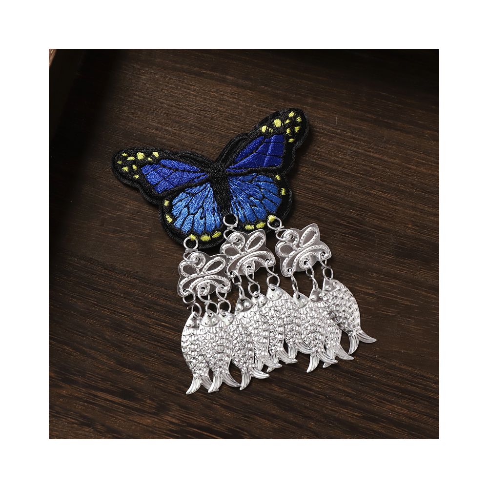 Dark blue butterfly earrings with traditional silver tassels