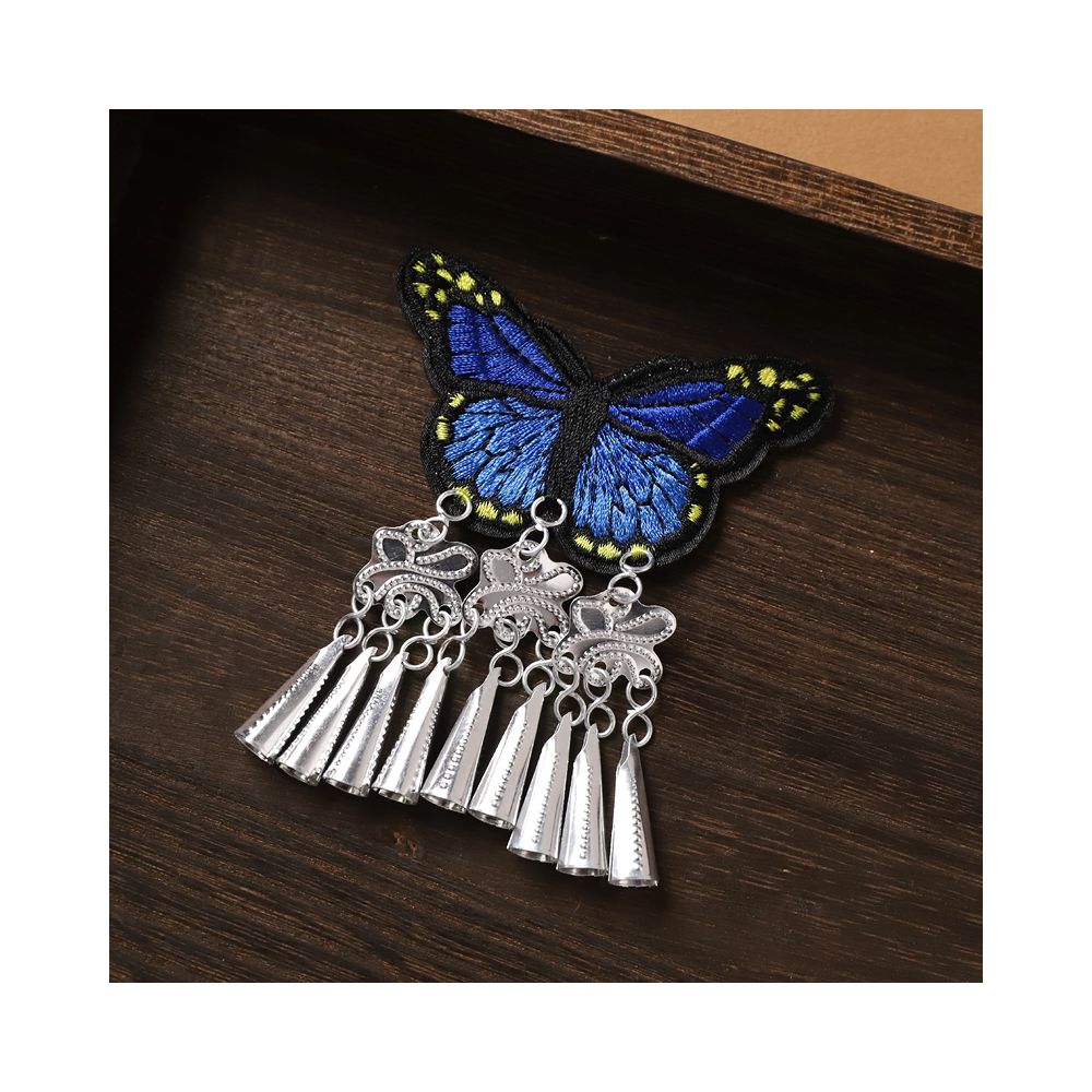 Dark blue butterfly earrings with silver tassel fringe