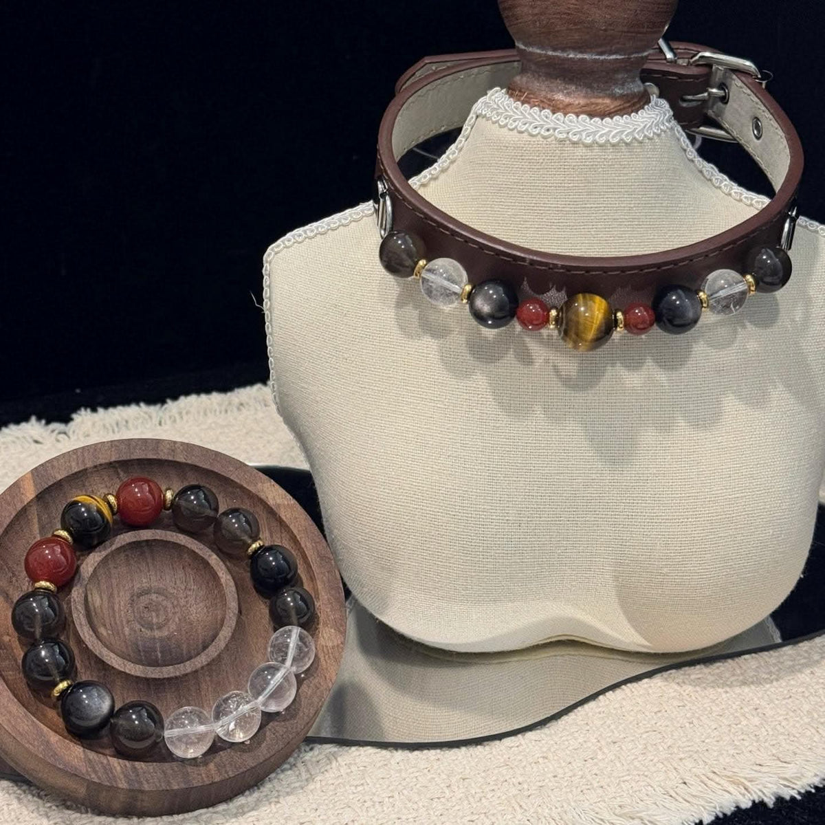 Dark brown leather pet collar with red yellow black beads displayed on mannequin bust | DIY Jade