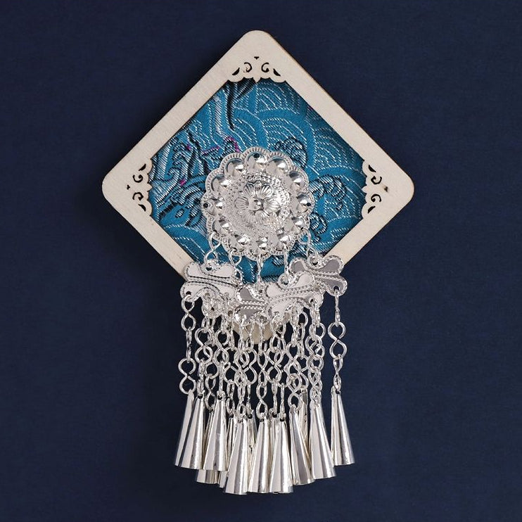 Diamond‑shaped hollow fridge magnet, blue brocade background, Miao silver pendant decor