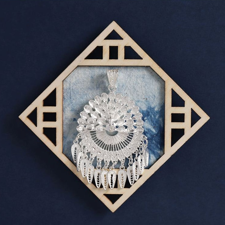 Open‑work diamond fridge magnet, blue tie‑dye cloth, Miao silver central pendant ornament