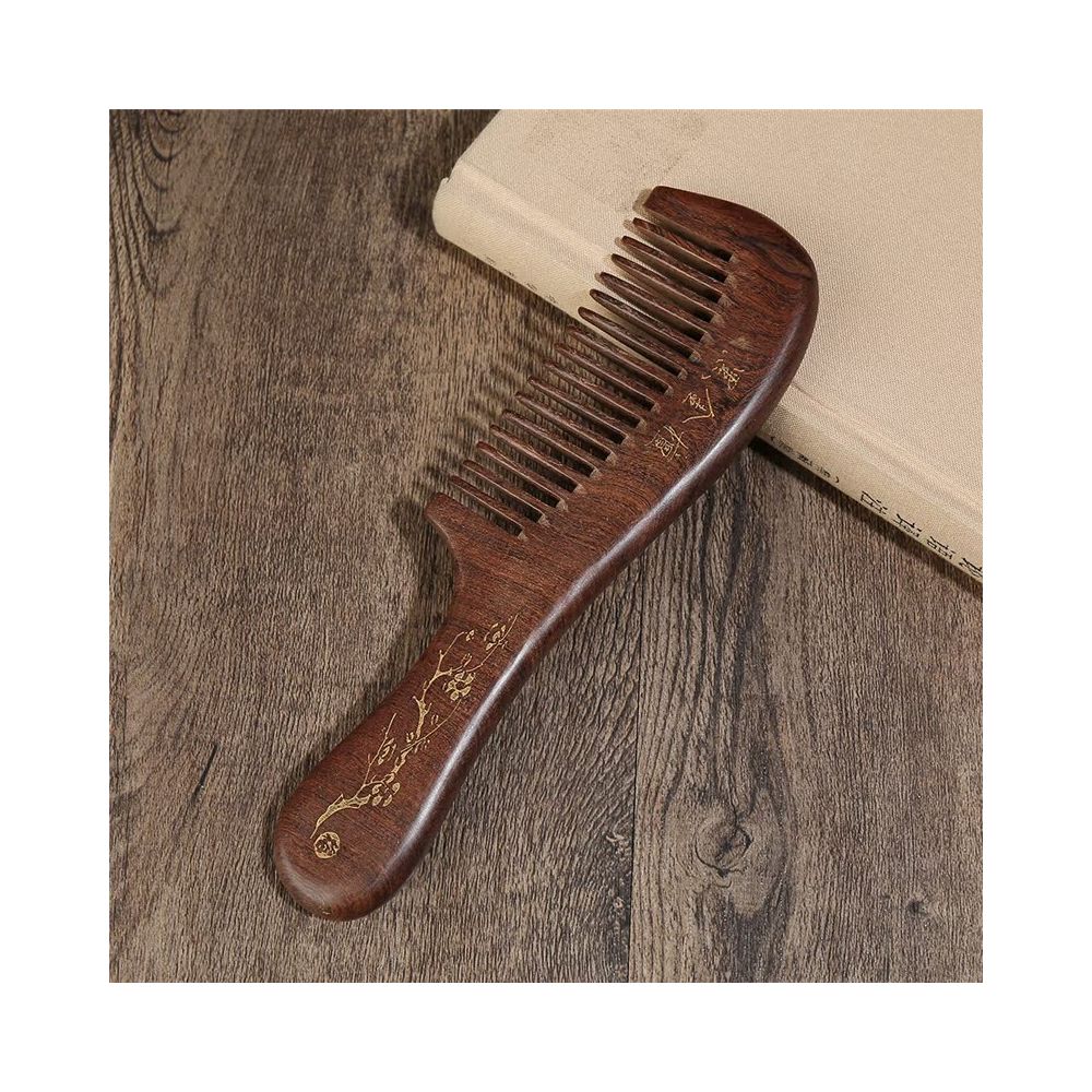 Close up of ebony wood hair comb handle texture