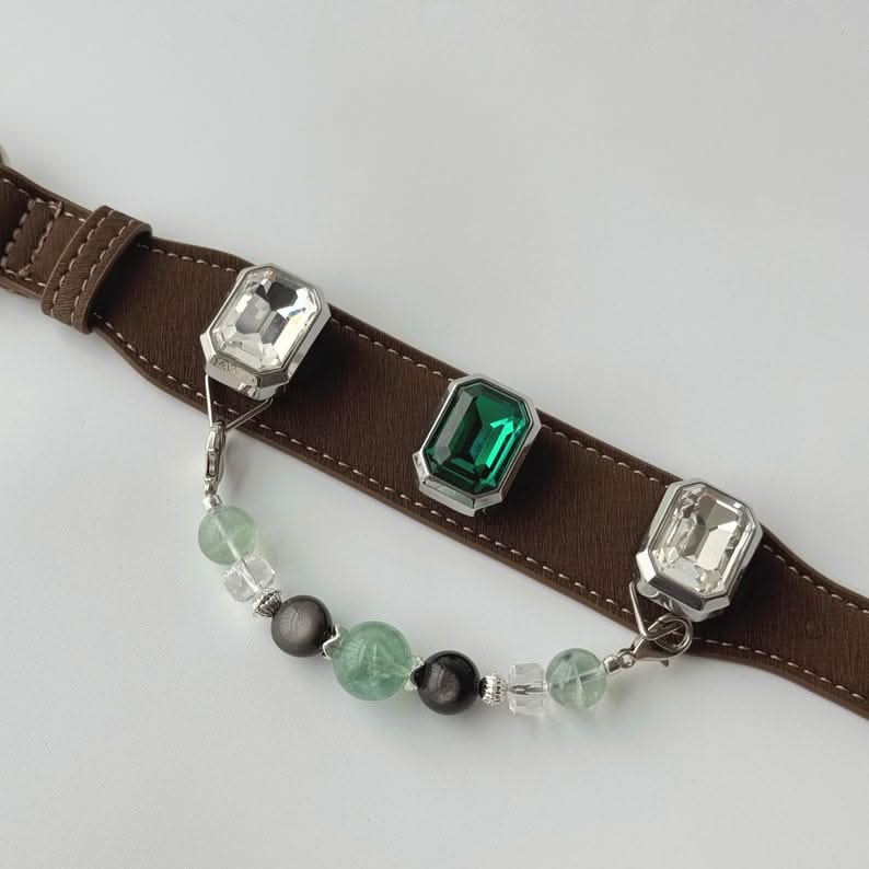 Emerald gemstone brown leather pet collar flat lay showing strap, buckle and beaded chain detail | DIYJade