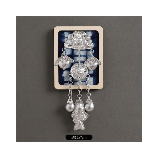 Large ethnic silver tassel brooch set display