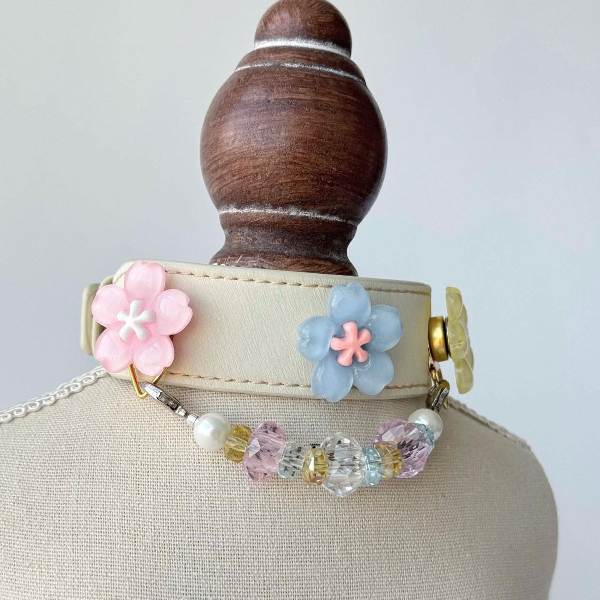Pastel flower charm pet collar with bead chain displayed on mannequin bust | DIY Jade
