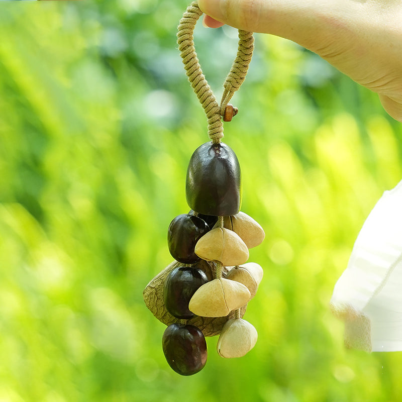 Hand‑held vertical stacked dark and light mixed seed pod pendant | DIY Jade