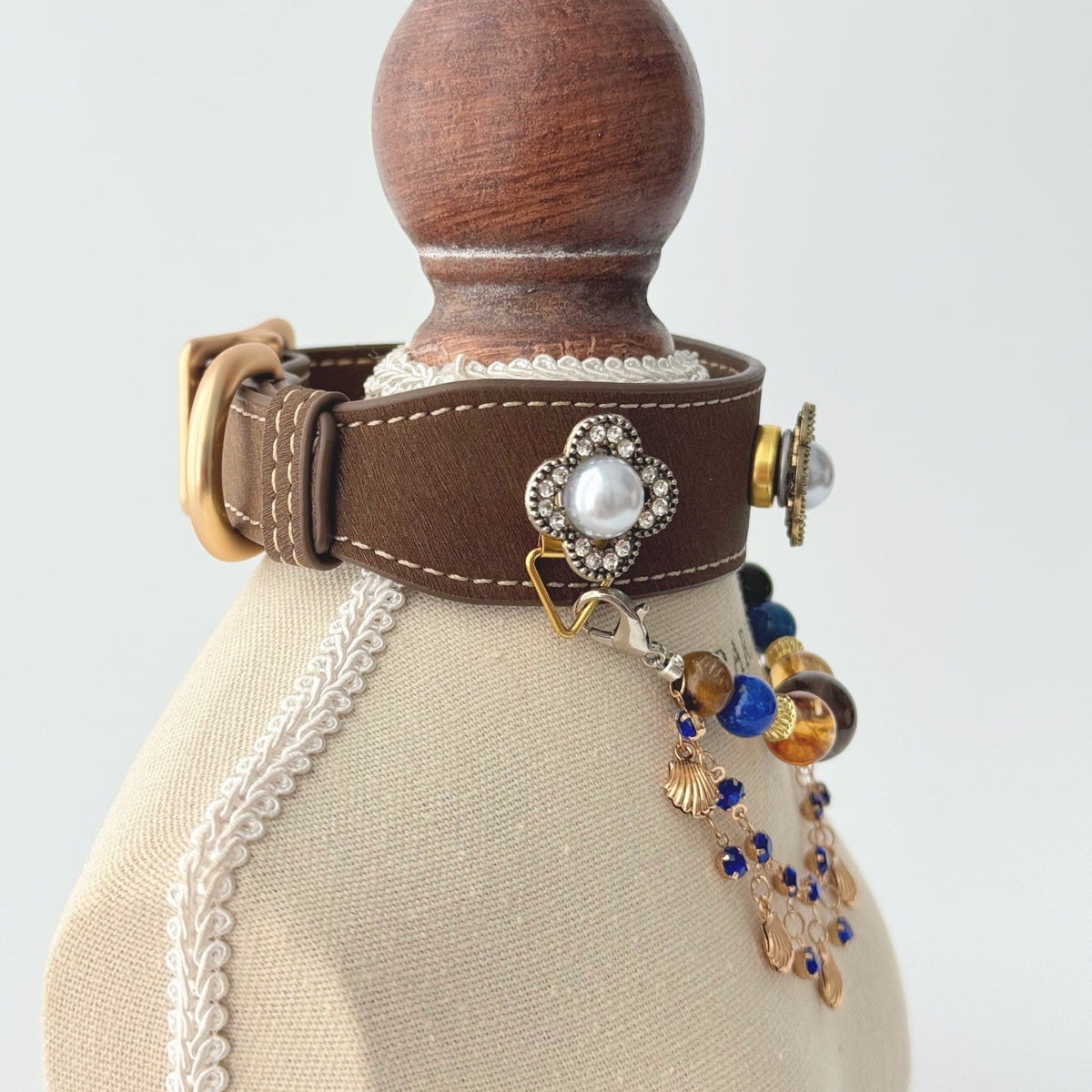 Side view of handmade luxury pet choker, brown leather base with removable multi-layer blue crystal seashell pendant chain | DIY Jade