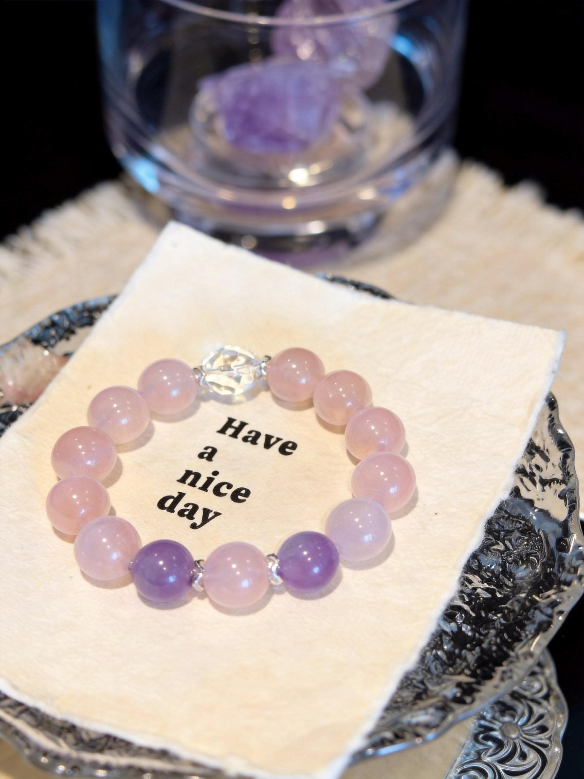 Lavender pink round bead human bracelet laid on paper note card | DIY Jade