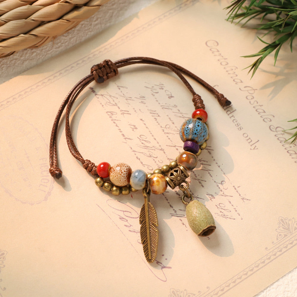 Boho bracelet with light beige stone charm and feather | DIY Jade
