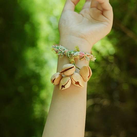 Light seed shell bracelet worn outdoors | DIY Jade