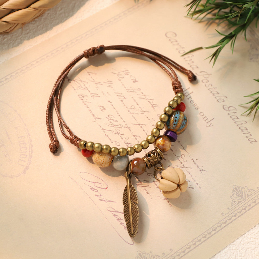 Boho bracelet with light stone charm and feather pendant | DIY Jade