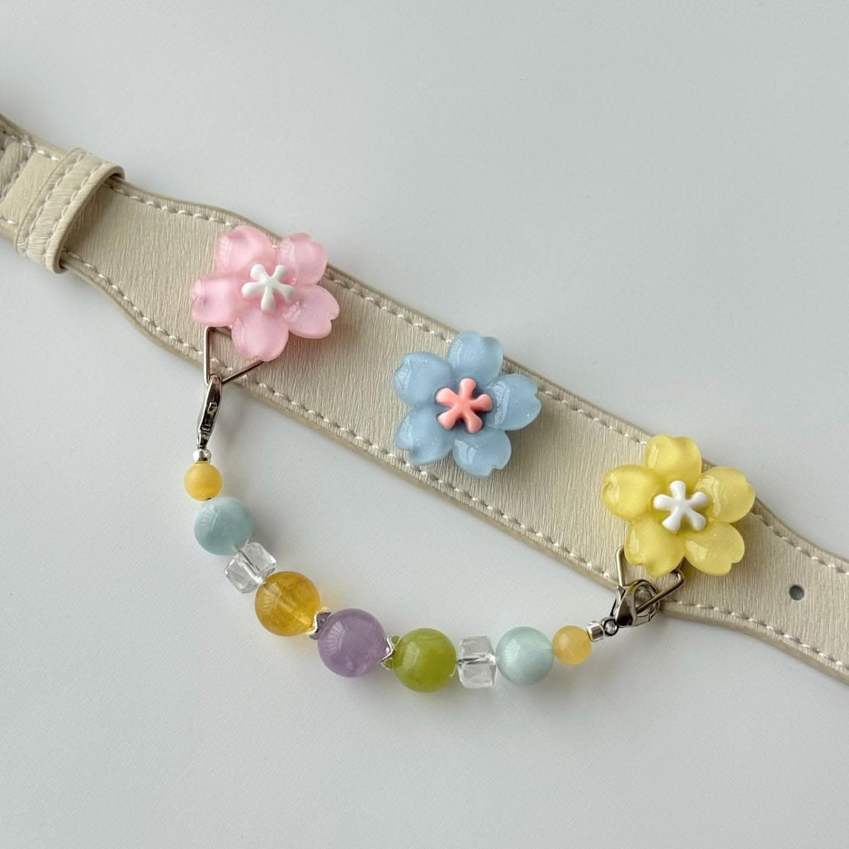 Light beige pet collar with multi‑color flower charms and mixed bead drop chain detail | DIY Jade