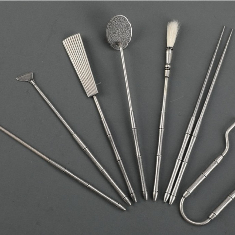 Close-up of spread-out metal incense tools | DIY Jade
