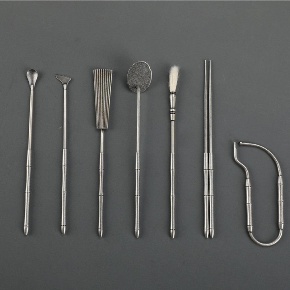Metal incense tools lined up neatly | DIY Jade