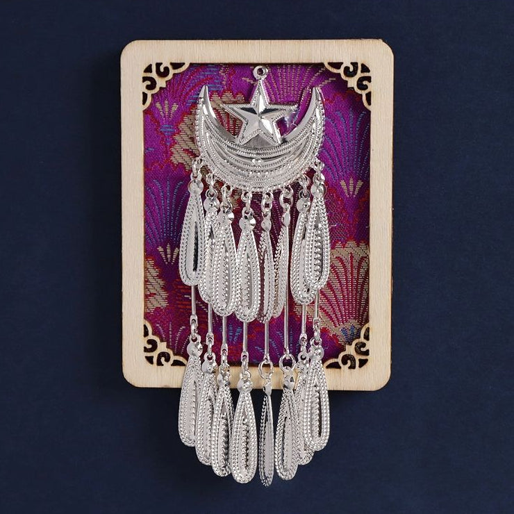 Vertical rectangular fridge magnet, purple brocade base, elaborate Miao silver headpiece replica
