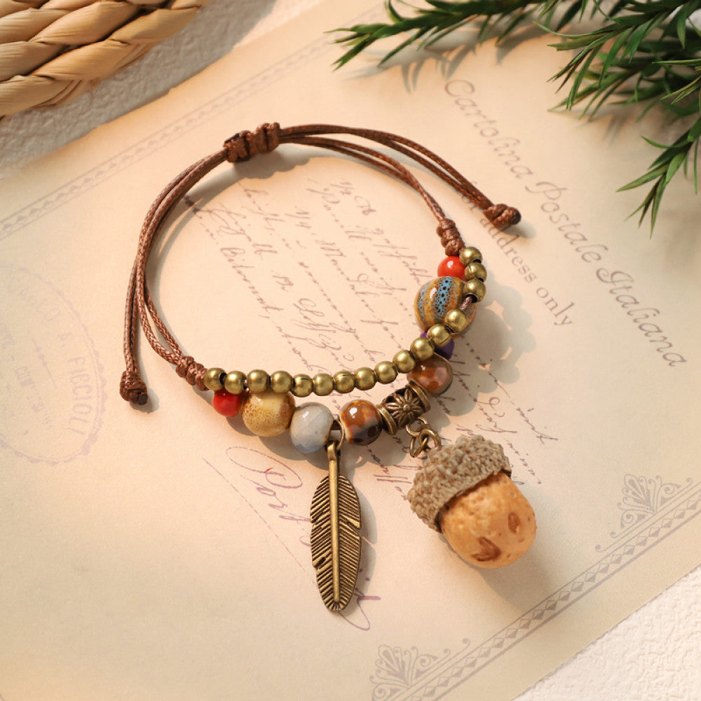 Mini acorn charm woven bohemian bracelet with feather | DIY Jade
