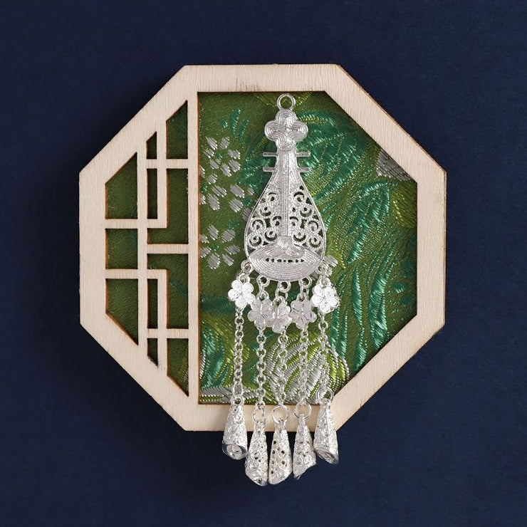 Octagon wood frame fridge magnet, green background Miao silver headpiece craft