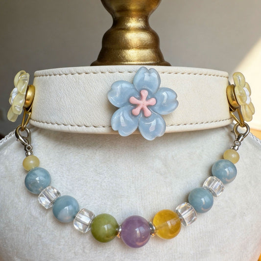 Off-white leather pet collar closeup with blue sakura flower decor and colorful round jade bead chain | DIY Jade