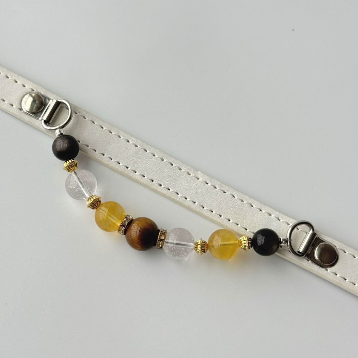 Top view off-white leather collar strap with dangling yellow gem bead accessory chain | DIY Jade