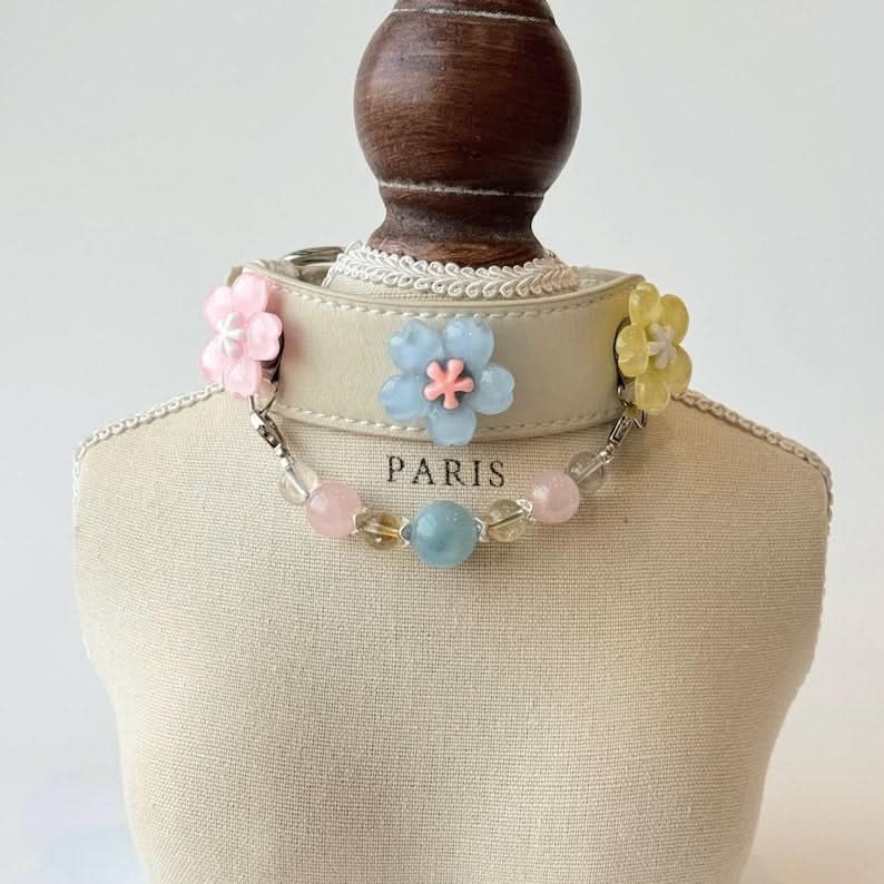 Pastel flower trio crystal pet collar with magnetic charms and beaded chain on mannequin bust | DIYJade