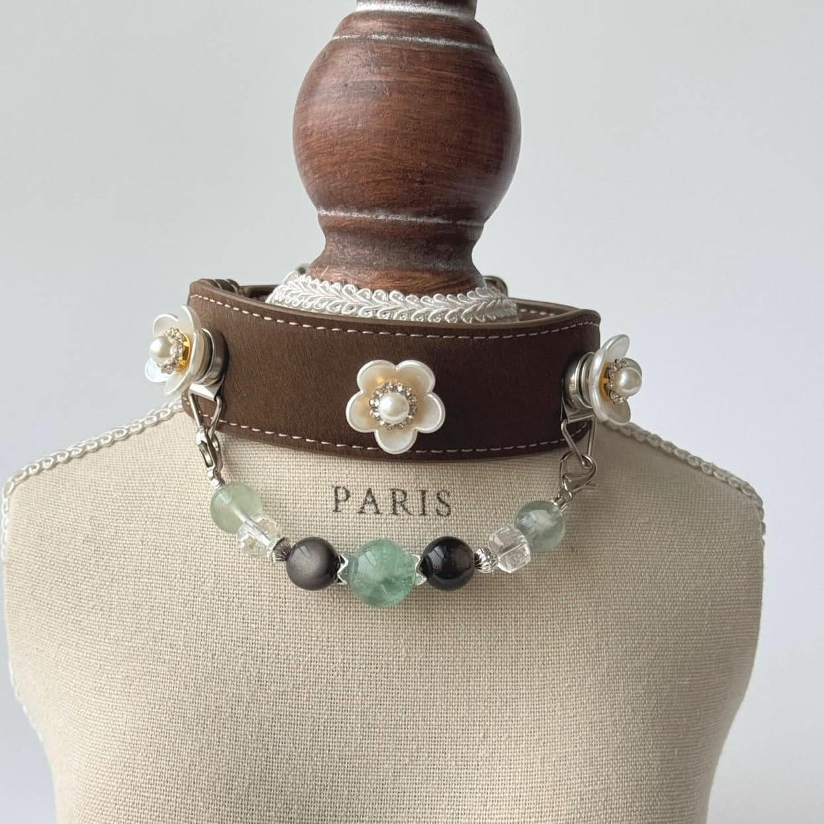 Pearl flower brown leather pet collar with beaded chain on mannequin bust, front view | DIYJade