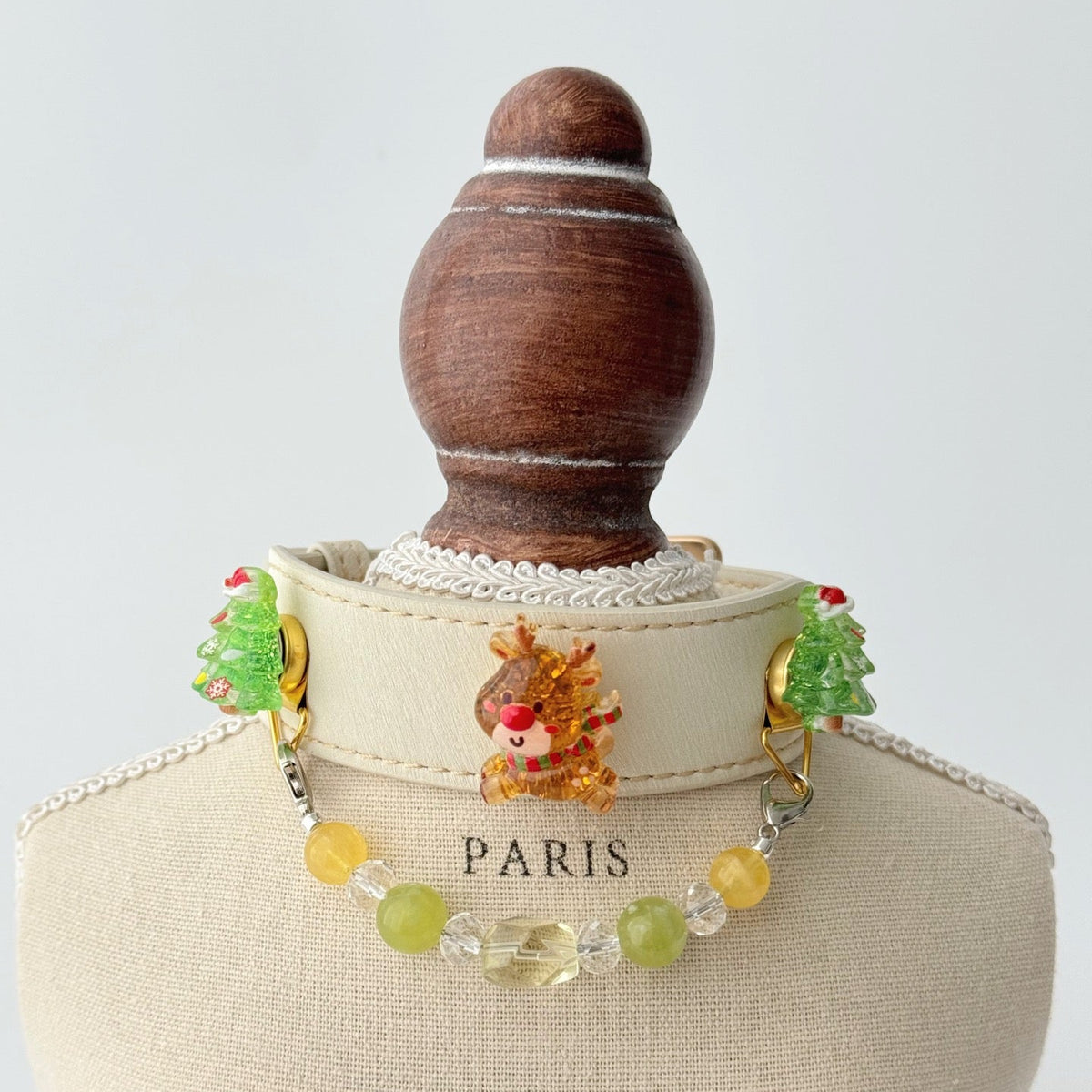 Pet collar, Cream leather Christmas dog collar with reindeer & tree charms, beaded chain front view on mannequin |DIY Jade