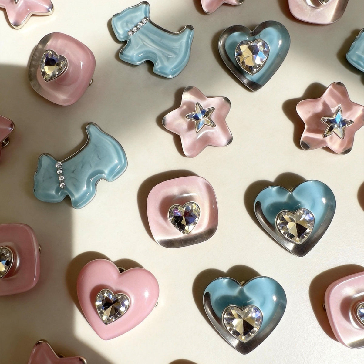 Pastel pink blue heart star dog‑shaped rhinestone charms for pet collars flat lay | DIY Jade