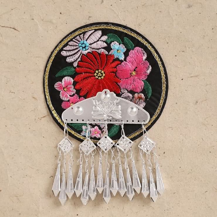 Pink floral embroidered tassel decor