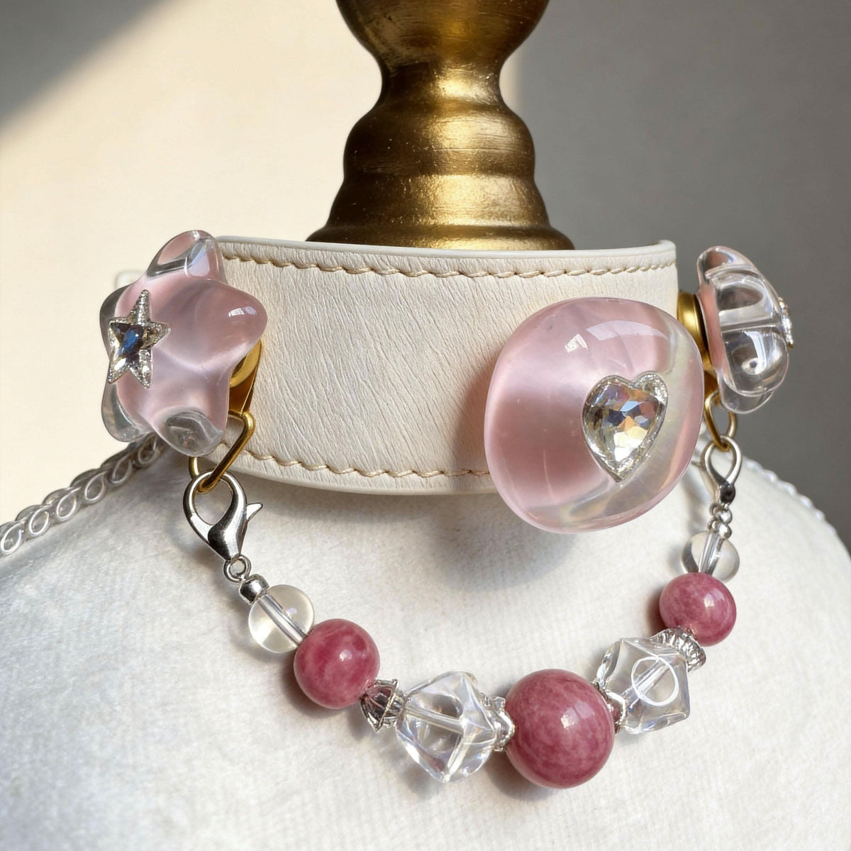Mannequin bust displaying white pet collar with heart crystal and pink jade beads | DIY Jade