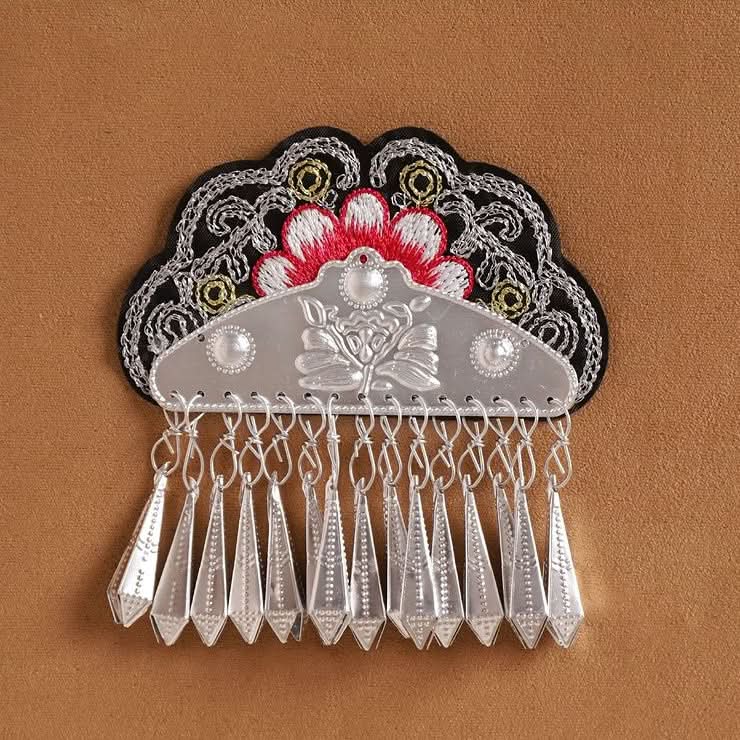 Pink blossom applique, heavy layered silver tassels, traditional folk clothing decoration