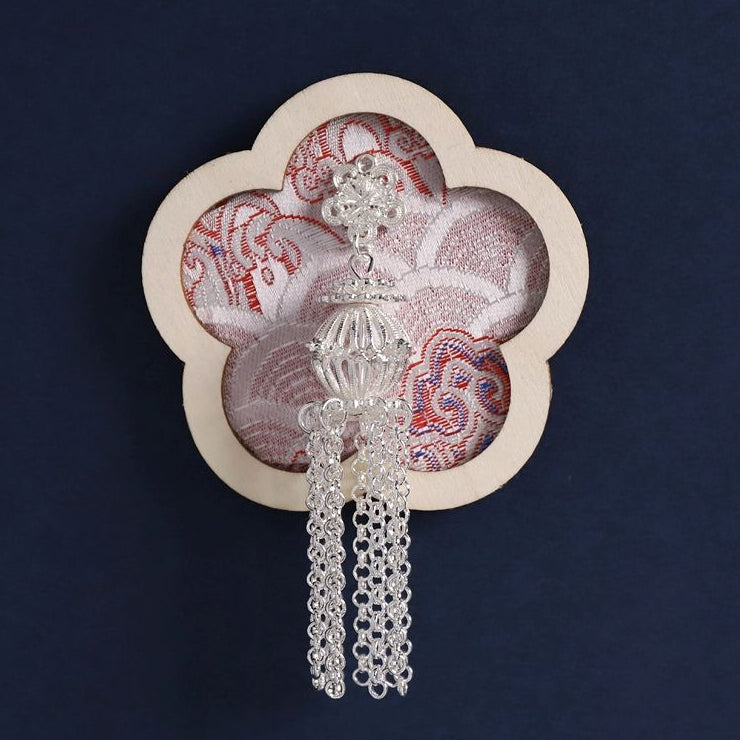 Pink plum‑blossom fridge magnet, soft brocade fabric with Miao silver tassel details