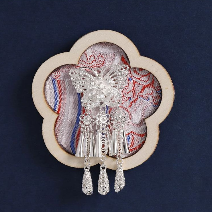 Plum blossom shape fridge magnet, Song brocade fabric with Miao silver tassels
