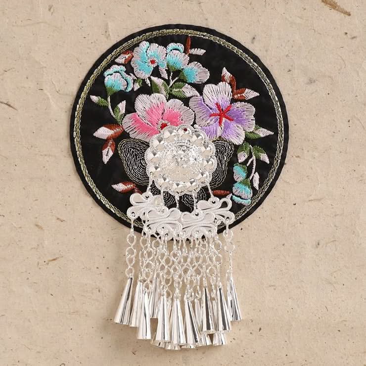 Purple embroidered tassel wall decor