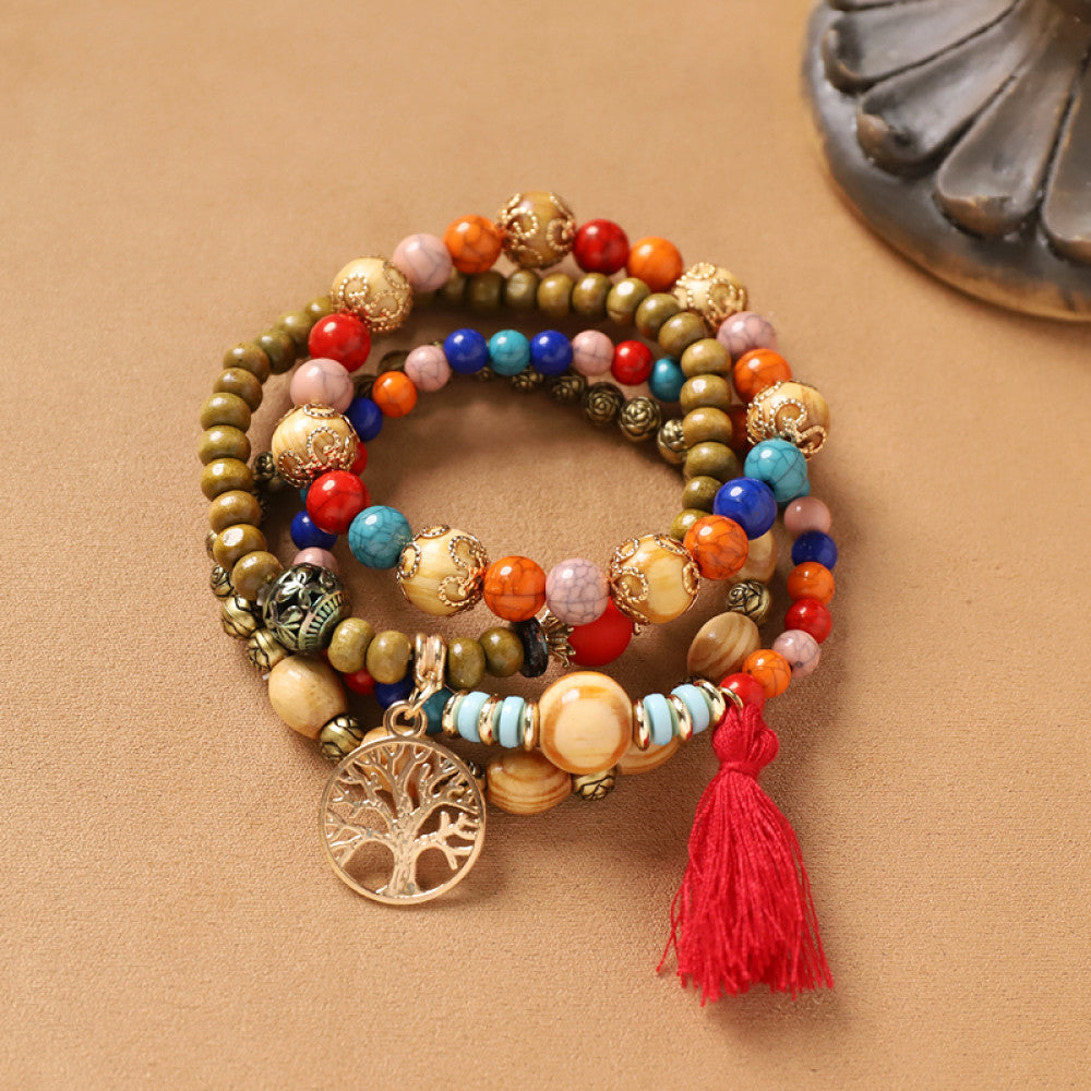 Colorful beaded boho bracelet with tree charm and red tassel | DIY Jade