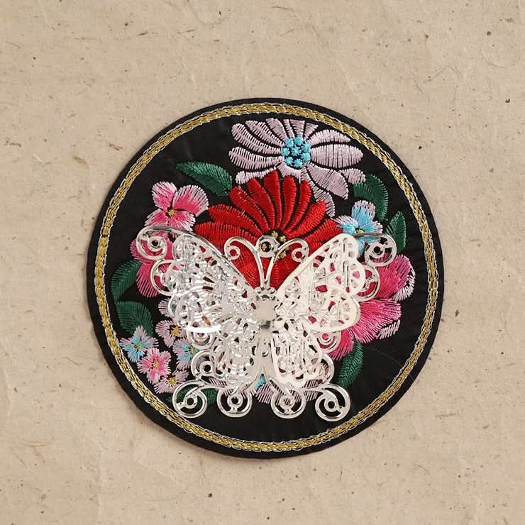 Red and black embroidered tassel wall hanging