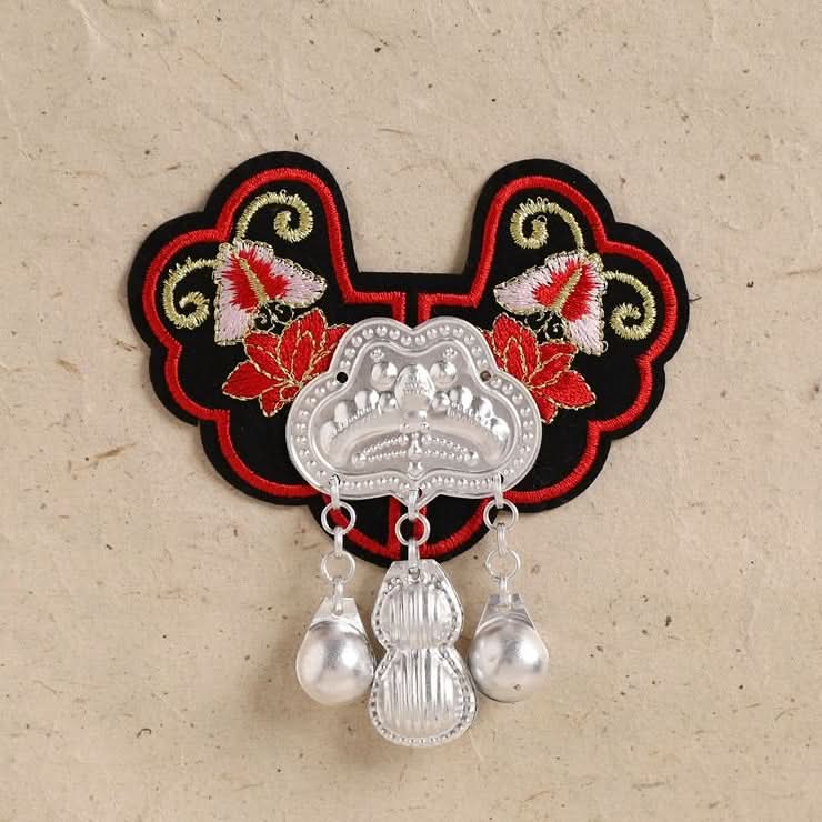 Red and black floral tassel ornament